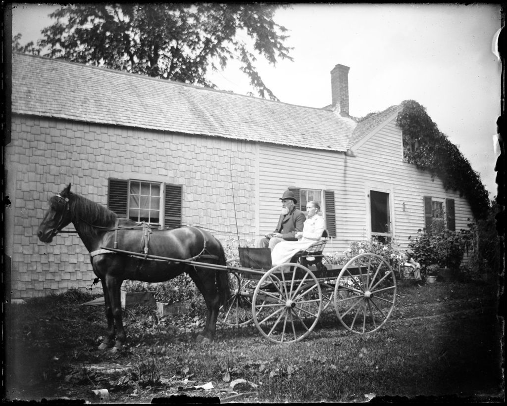 Miniature of Elderly Couple Sitting In A Horse Drawn Buggy Outside A Farm House