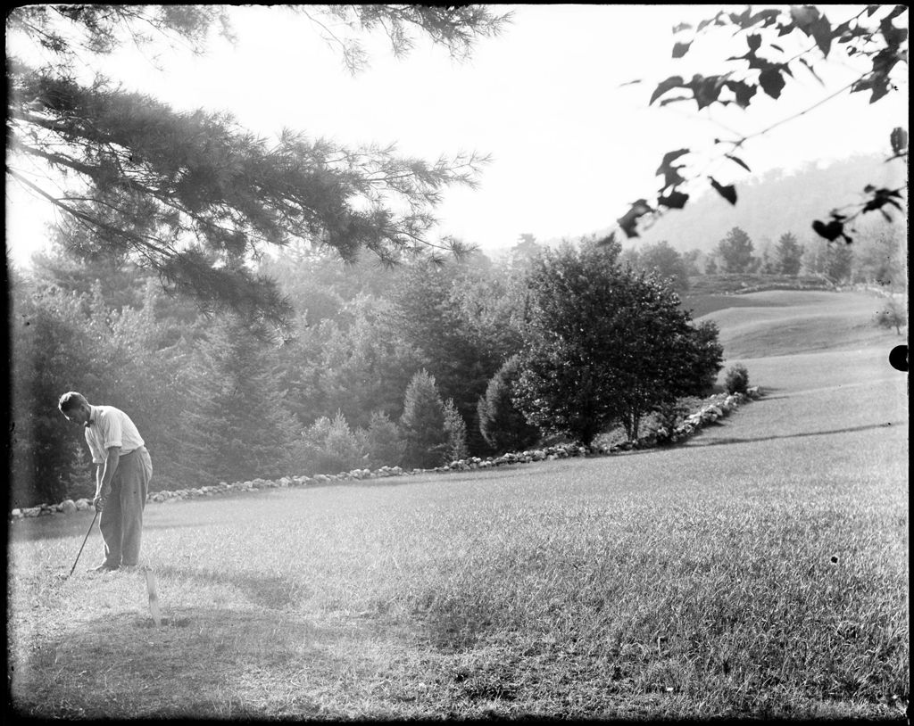 Miniature of George French Playing Golf In A Field