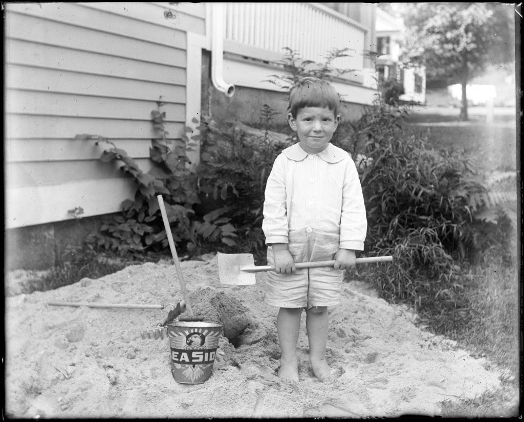 Miniature of Young Boy With Pail & Shovel In A Sandbox