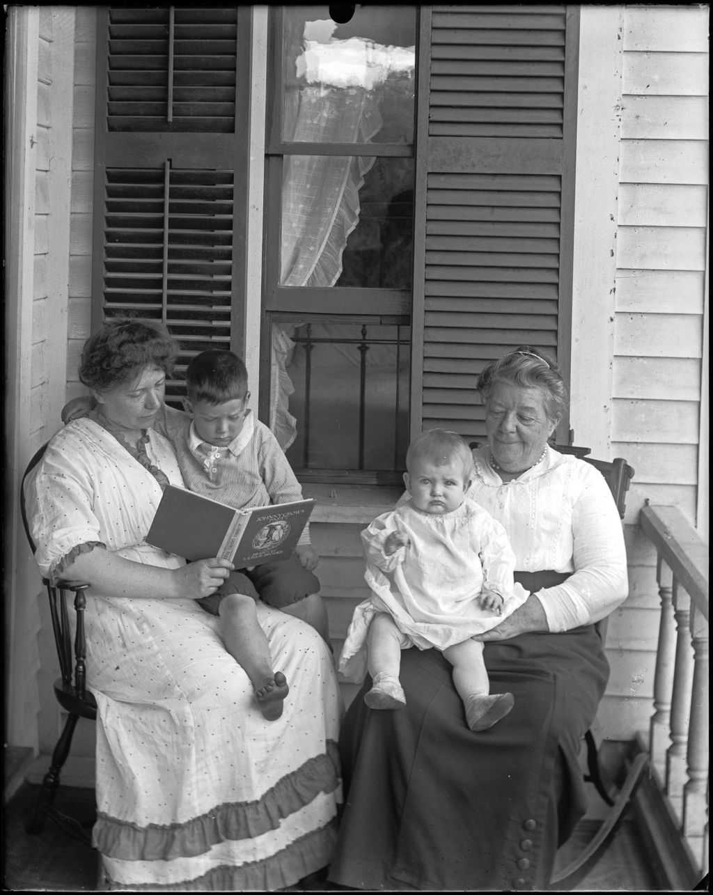 Miniature of Two Women With Children On Their Laps, One Reading A Book