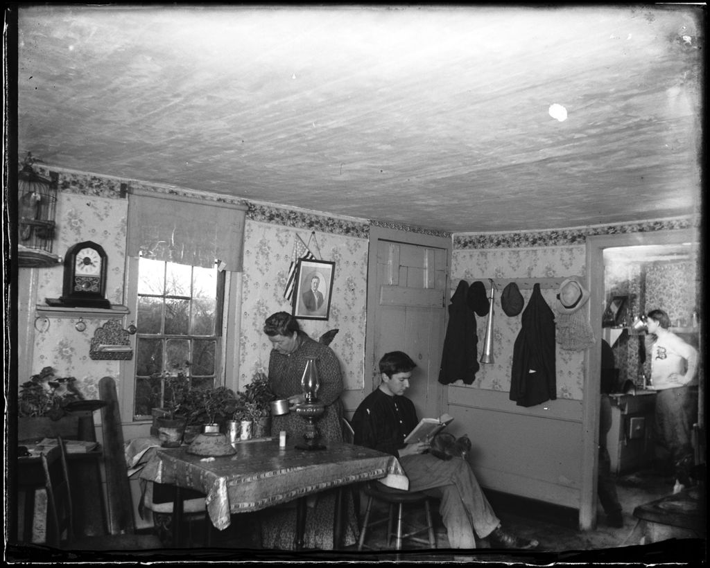 Miniature of Members Of The French Family Gathered In The Kitchen