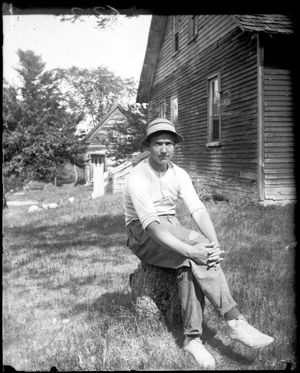 Miniature of Man Sitting On A Stump