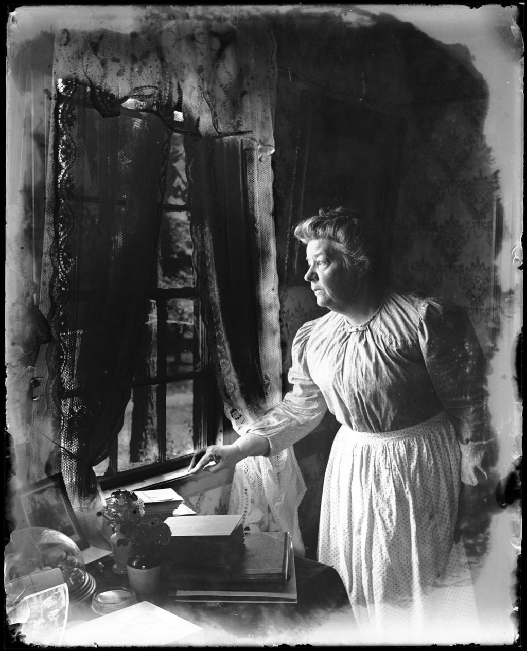 Miniature of Elderly Woman Peering Out Of A Window