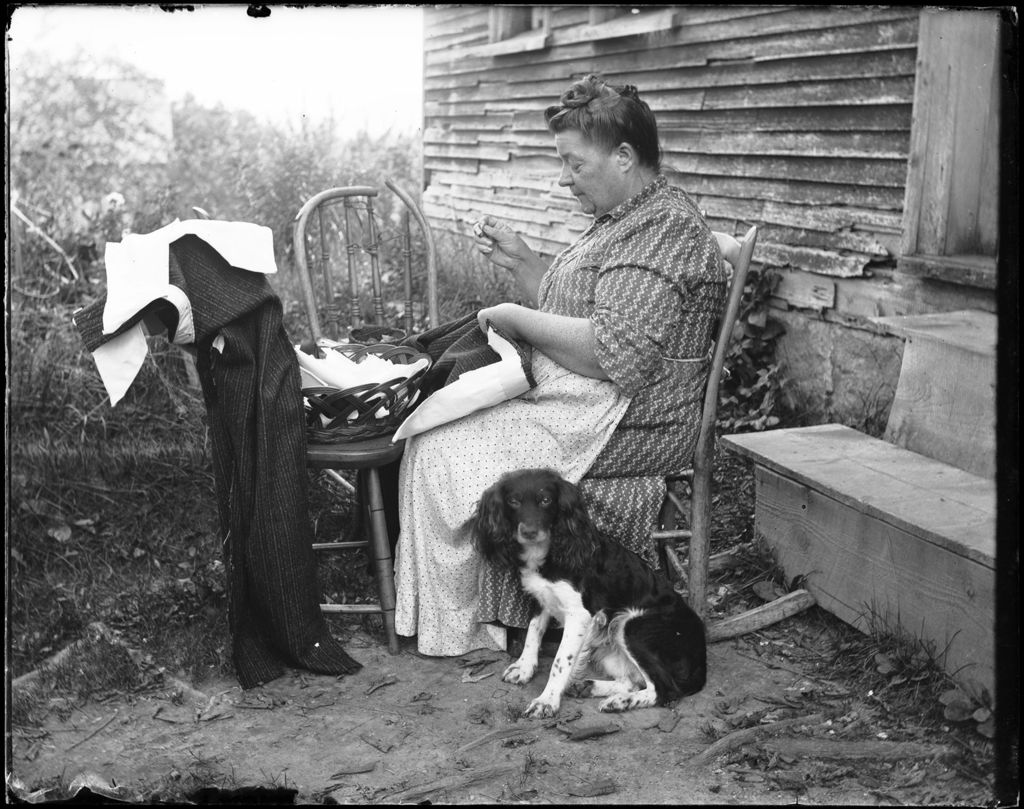 Miniature of Woman Sitting Outside Sewing, Dog At Her Feet
