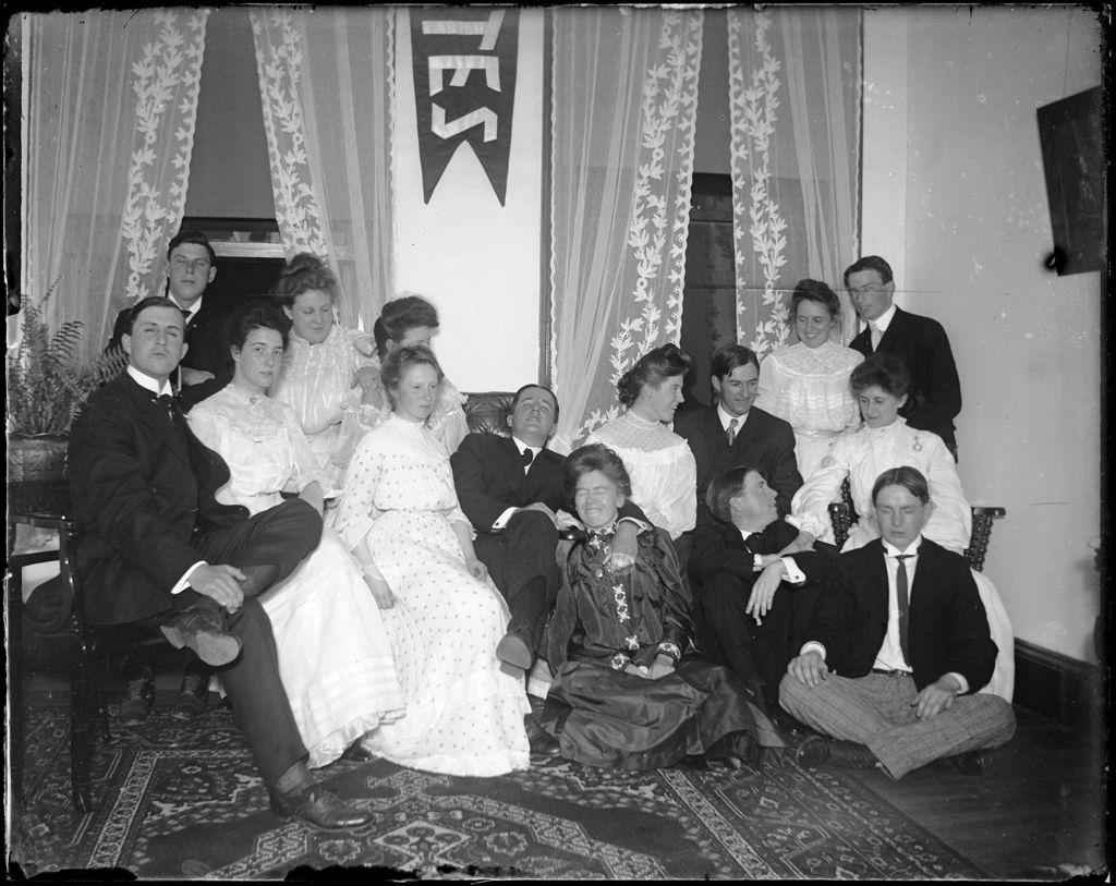Miniature of Group Of Dressed Up Coed College Students In A Sitting Room Of A Dorm