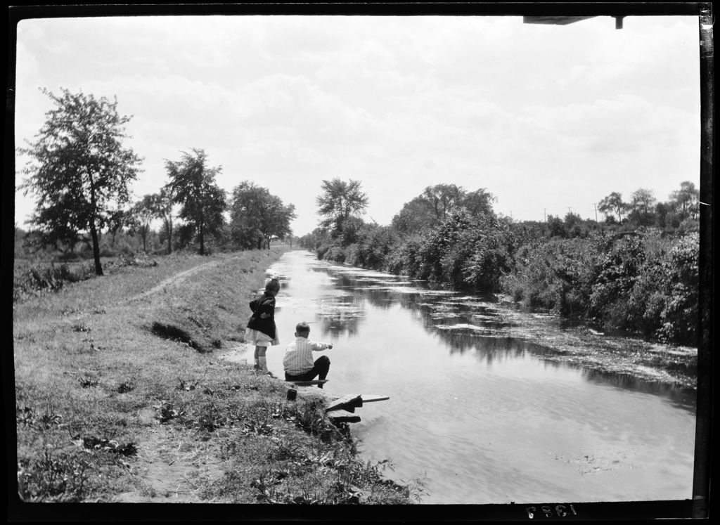 Miniature of Boy And Girl Playing Beside A Canal.
