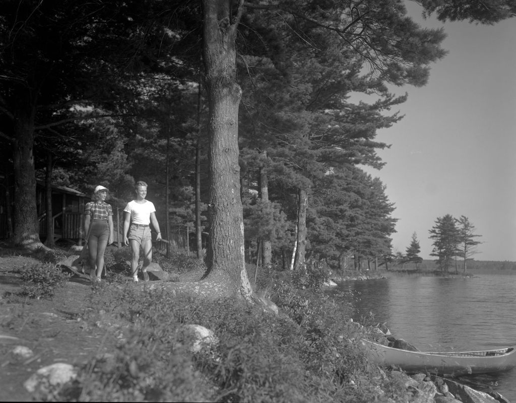 Miniature of Couple Walking Along The Shore By A Camp On A Lake In Jefferson