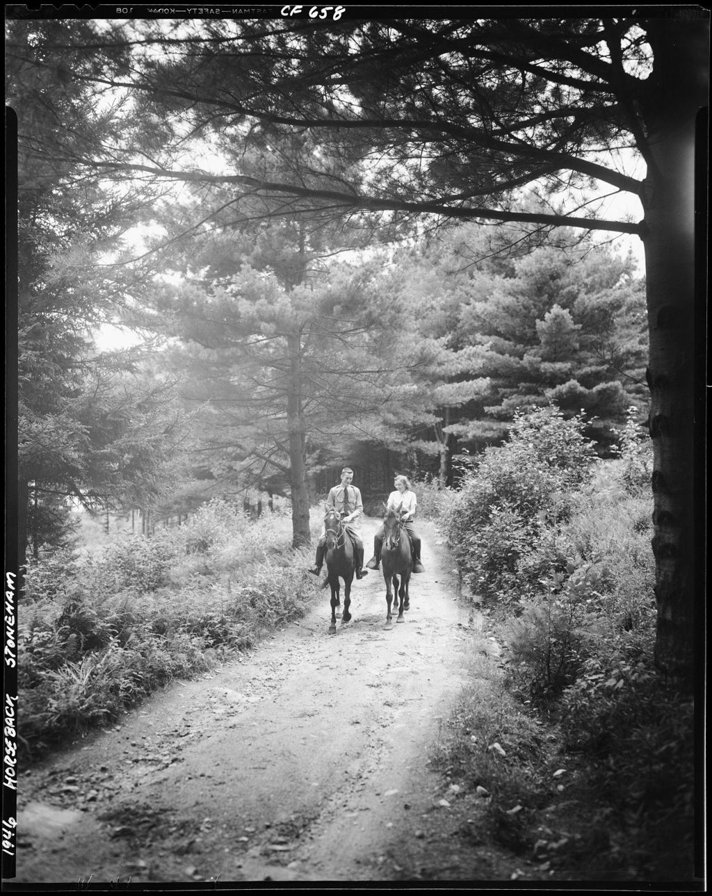 Miniature of Man And Woman Riding Down A Woods Road In Stoneham