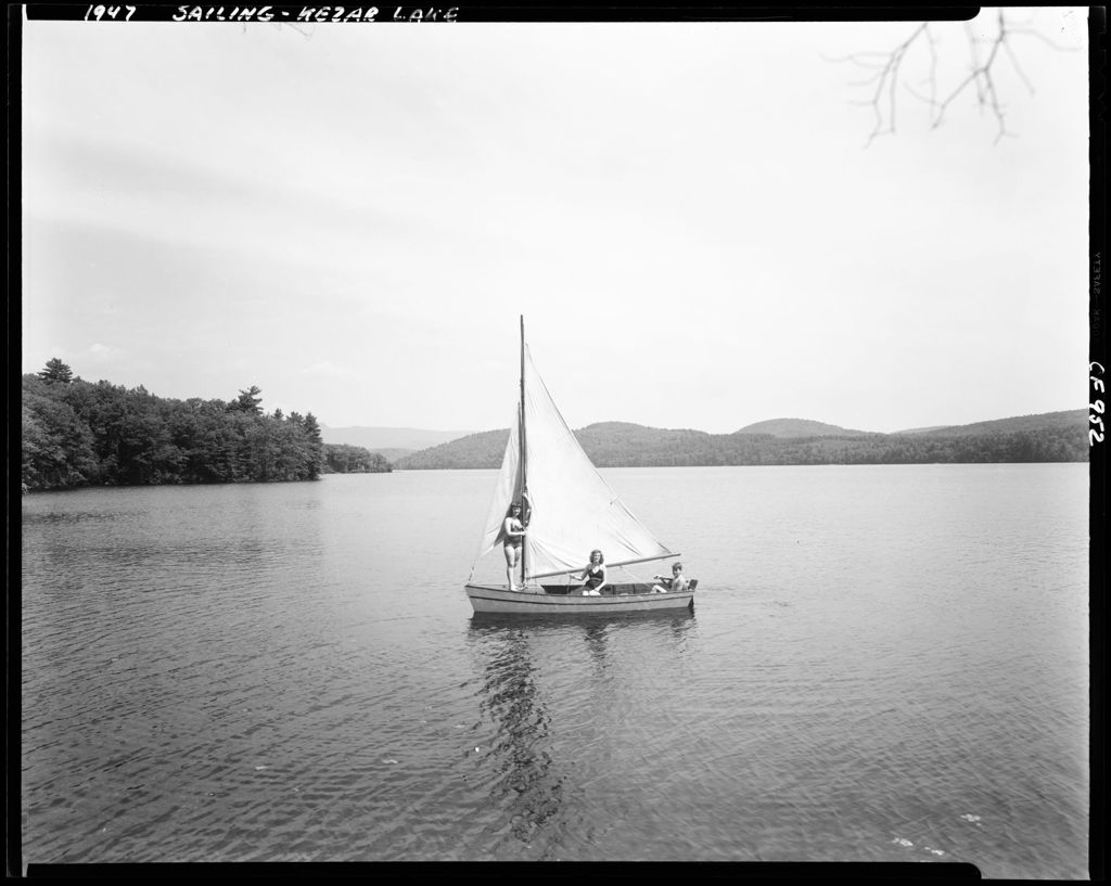 Miniature of Three People In A Small Sailboat On Kezar Lake