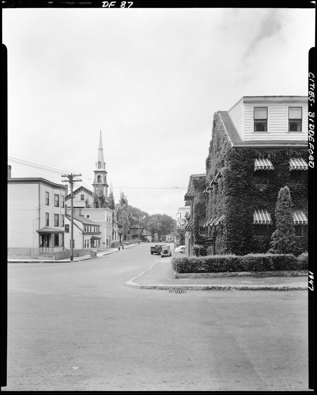 Miniature of Shot From Corner Of Street Showing Street, Houses, And A Church In Biddeford