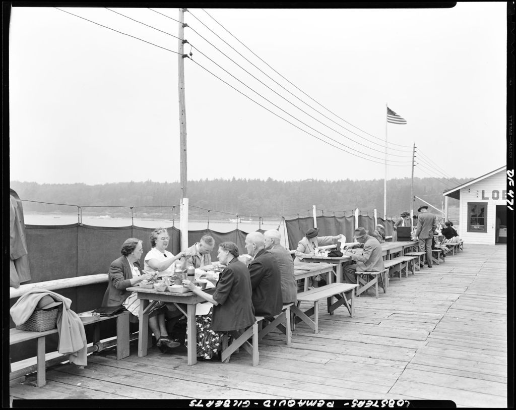 Miniature of Group Of People Eating Steamed Lobsters At A Pound In Pemaquid At Gilbert's.