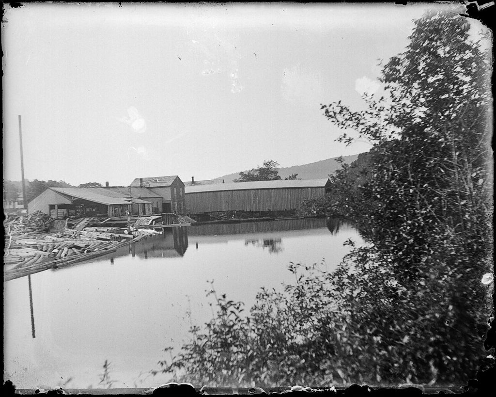 Miniature of View of lumber mill buildings on a river