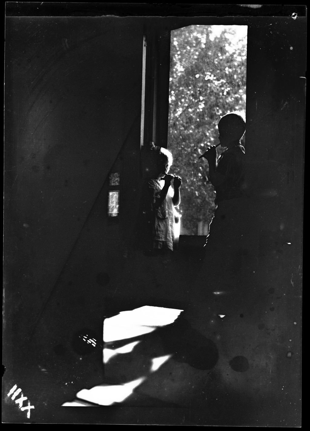 Miniature of Tots- Barbara And Don Play Whistle Near Front Door In Sun