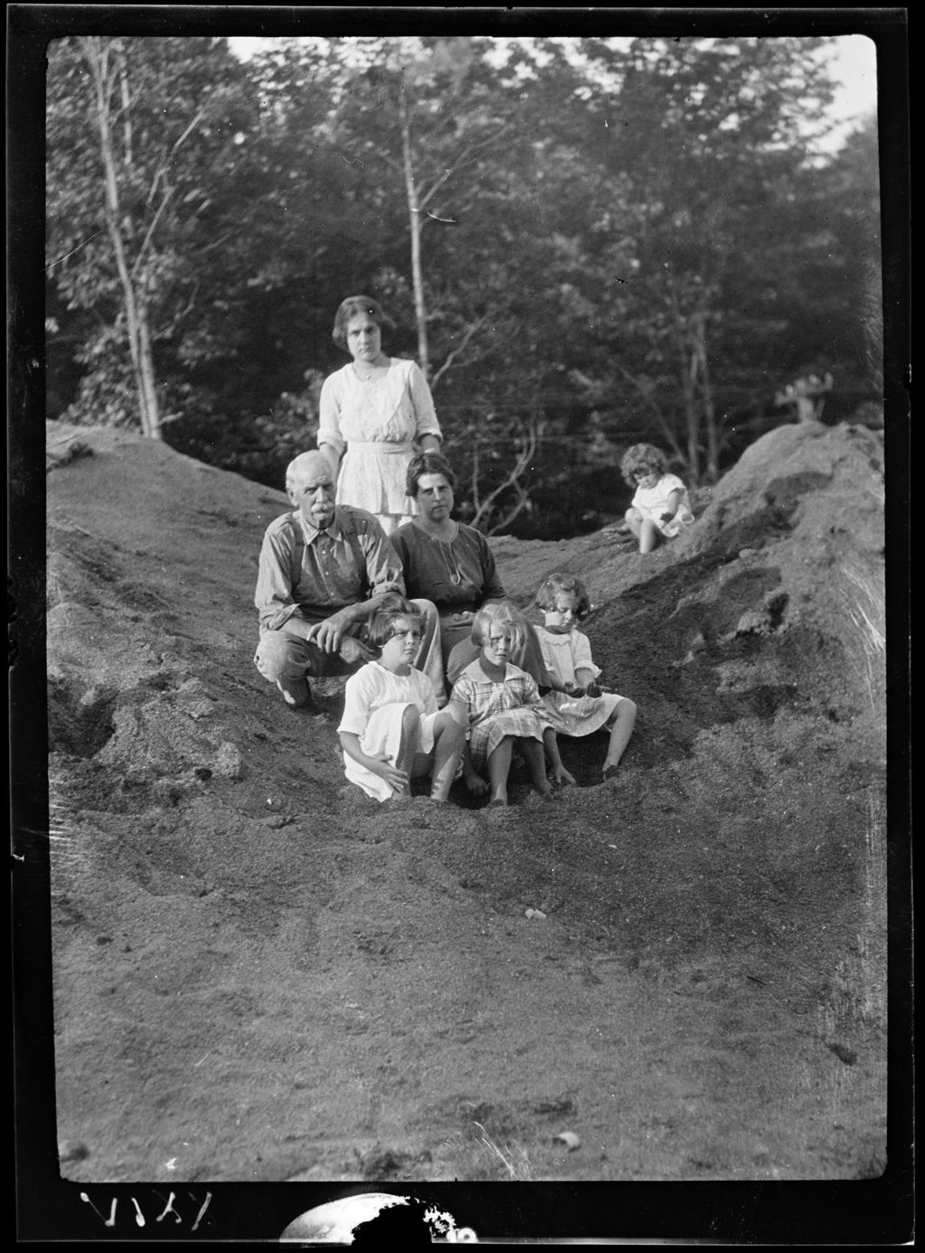 Miniature of Tots- Group Of 4 Tots And 3 Adults Sit In Sawdust