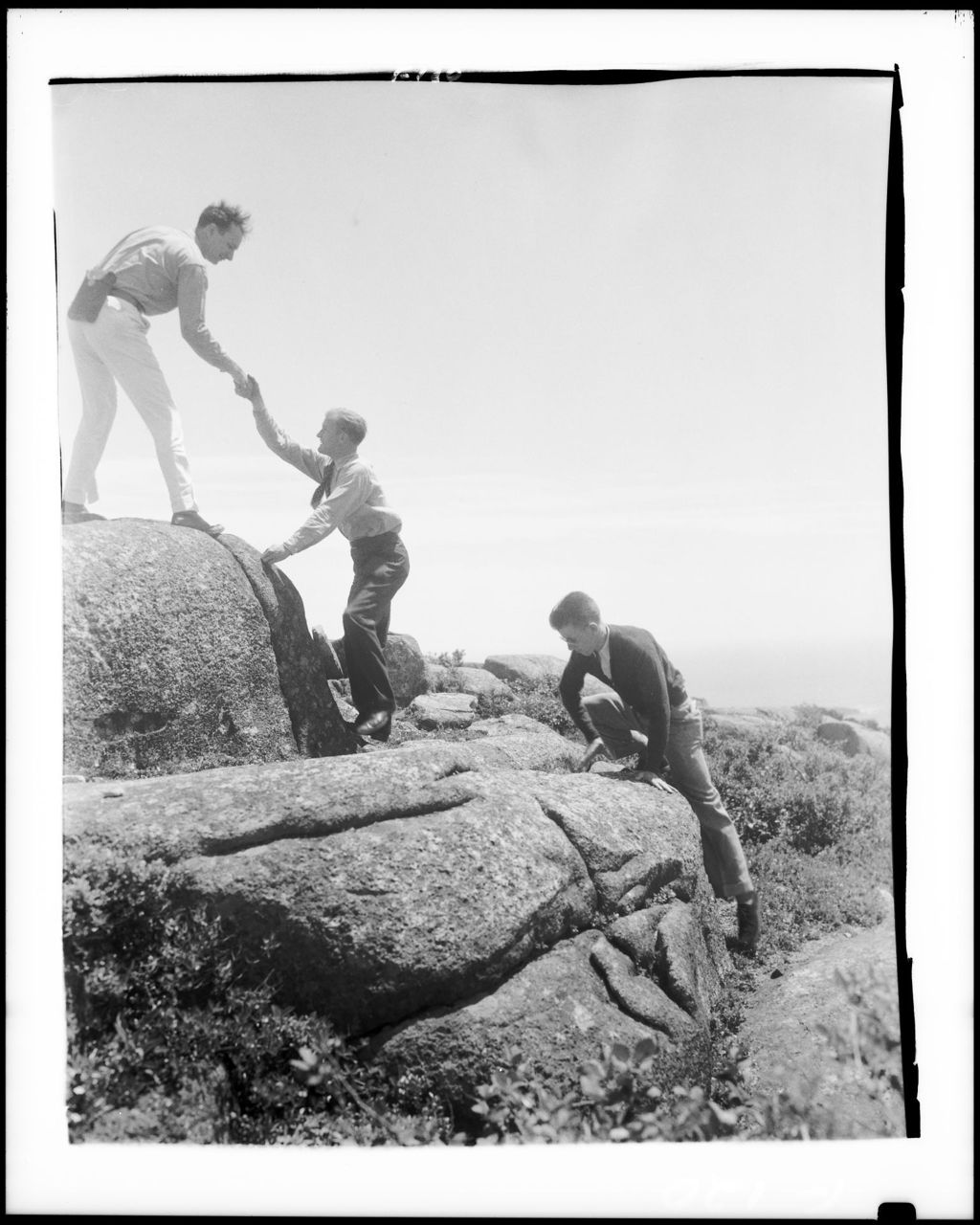 Miniature of Three Men Mountain Climbing
