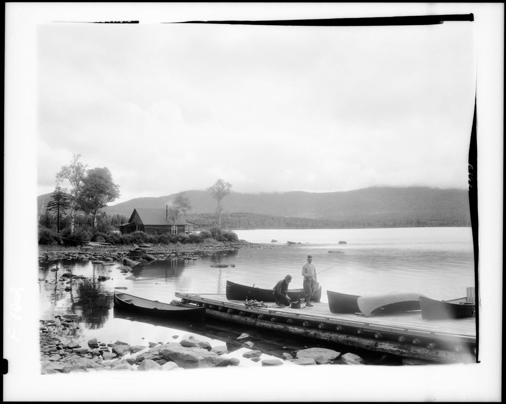 Miniature of Two Men Returning From Fishing, Camp In Background