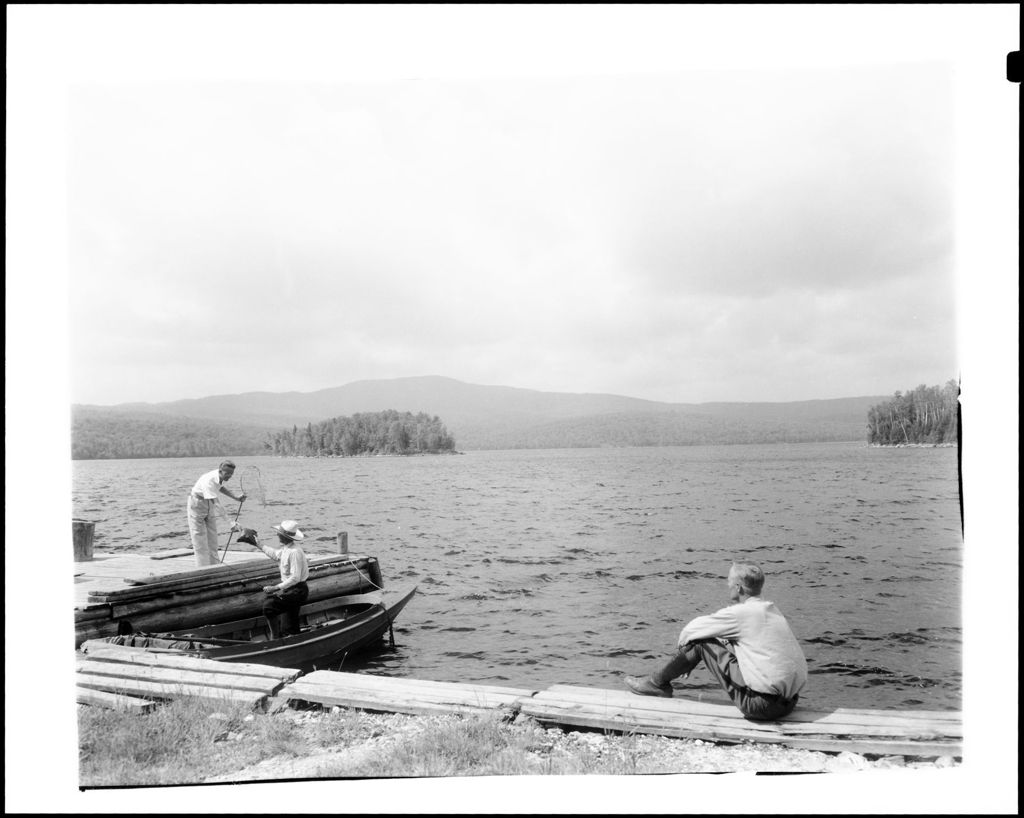 Miniature of Two Men Getting Ready To Go Fishing While Another Looks On
