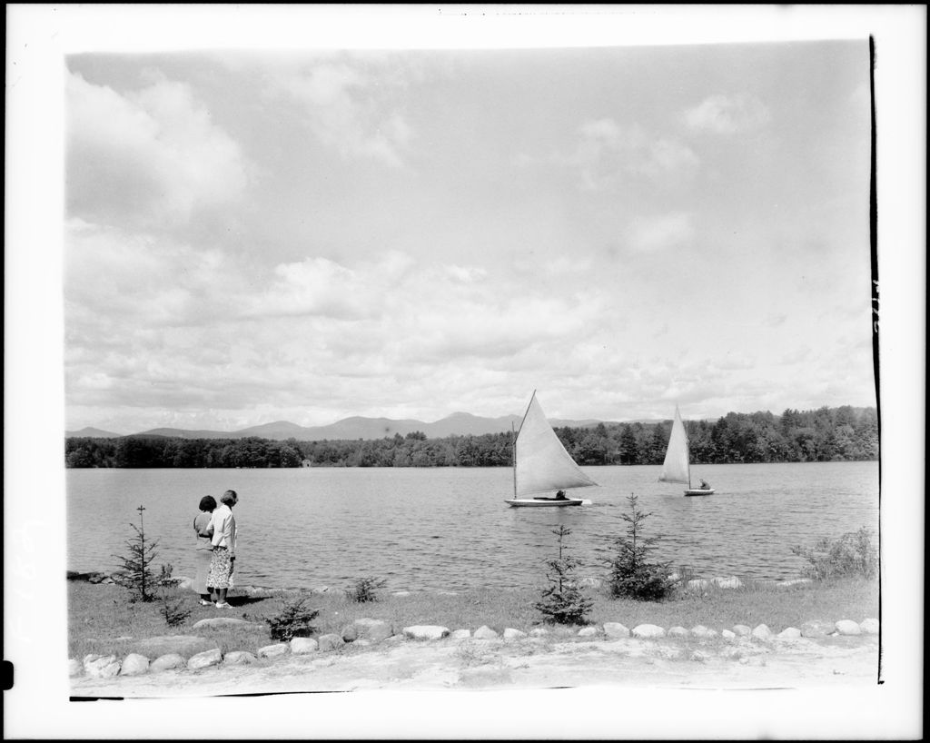 Miniature of Two Small Sailboats On A Lake, Mountains In The Distance