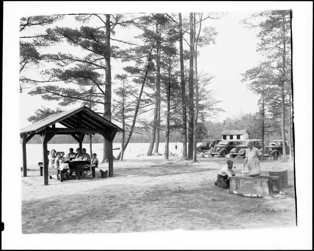Miniature of Family Cookouts At A Picnic Area In Woods Pond