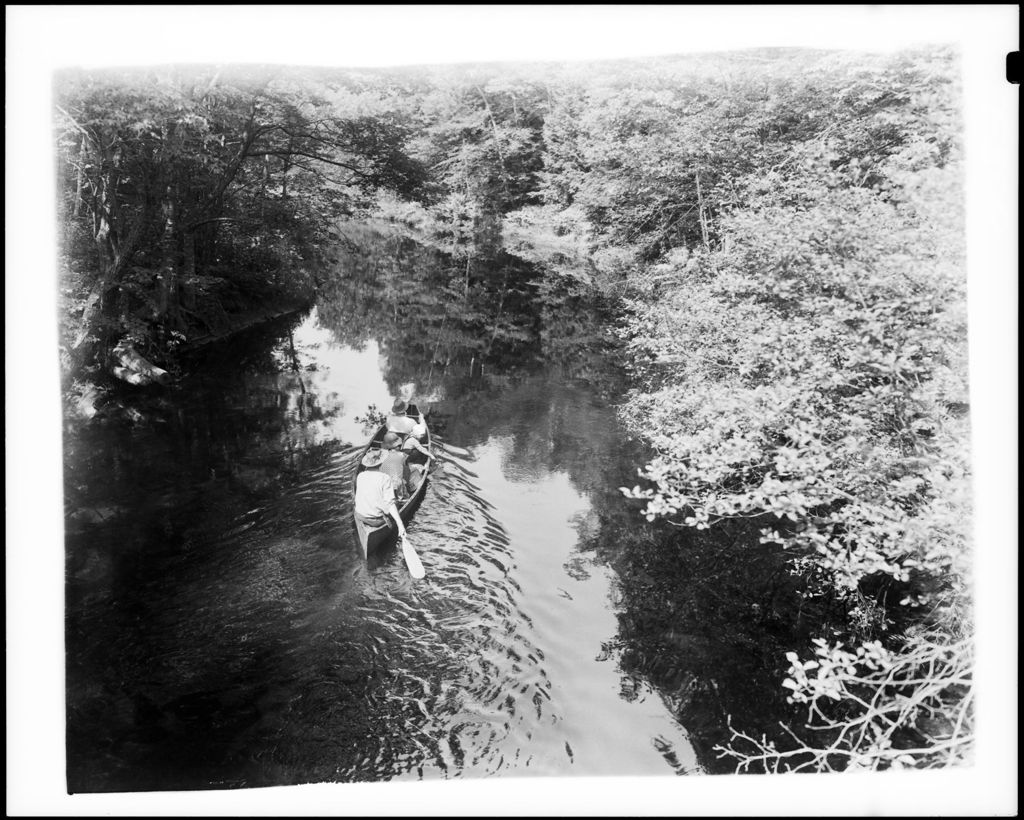 Miniature of A Family Canoeing Down Crooked River
