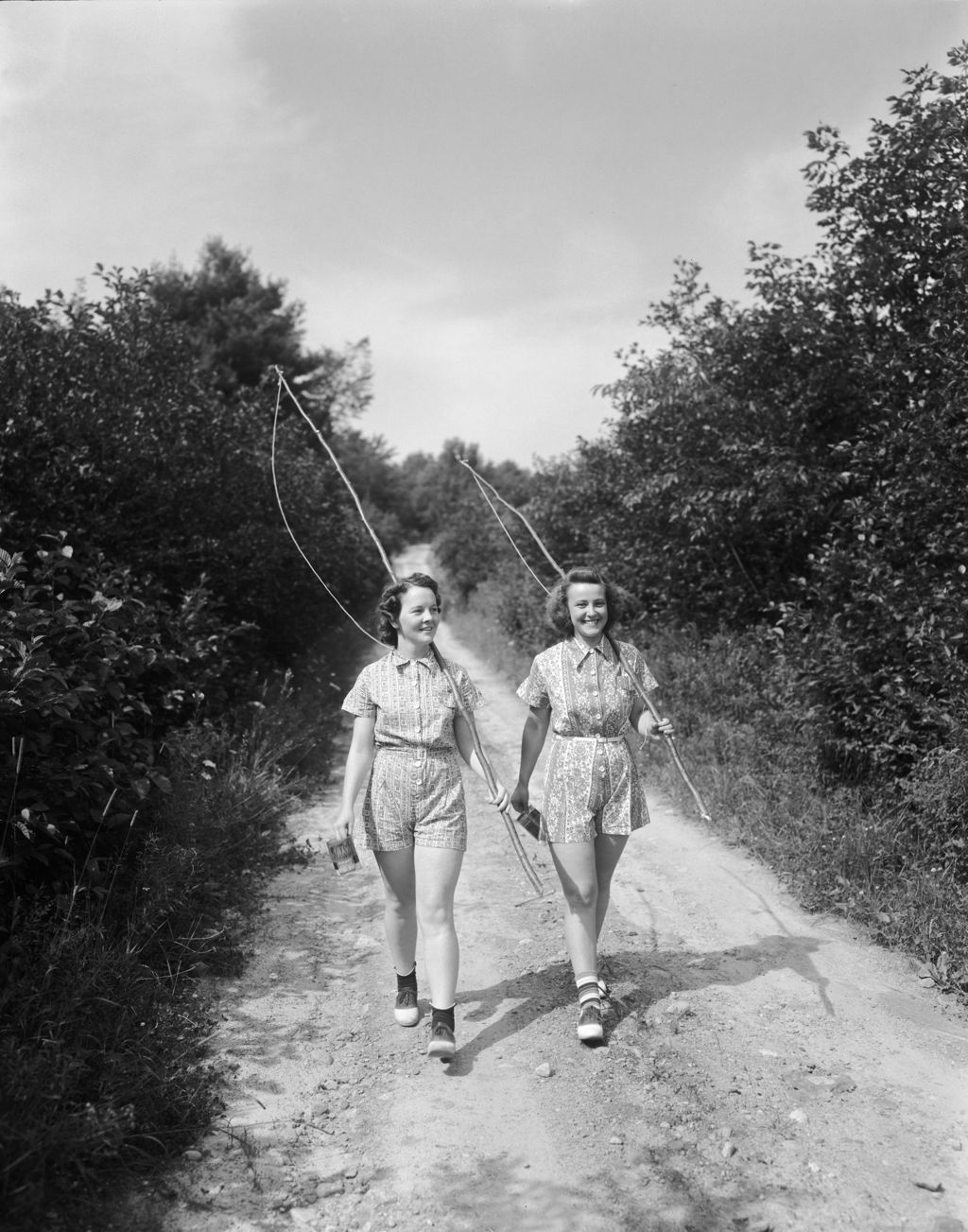 Miniature of Two Girls Going Out Fishing