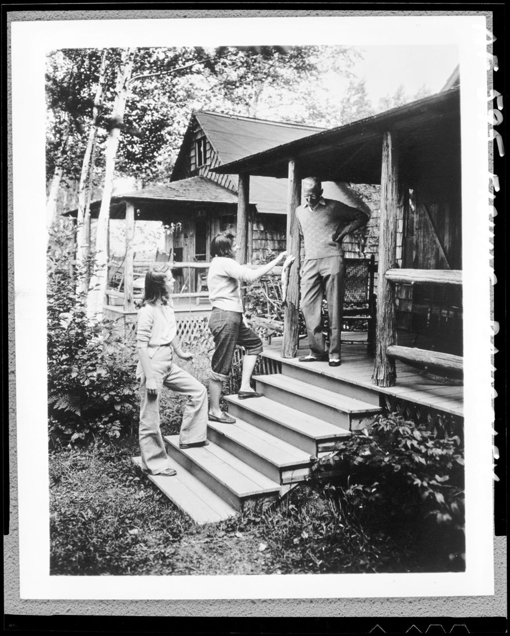 Miniature of Two Girls Showing Off Nice Catch Of Fish To Man On Camp Porch