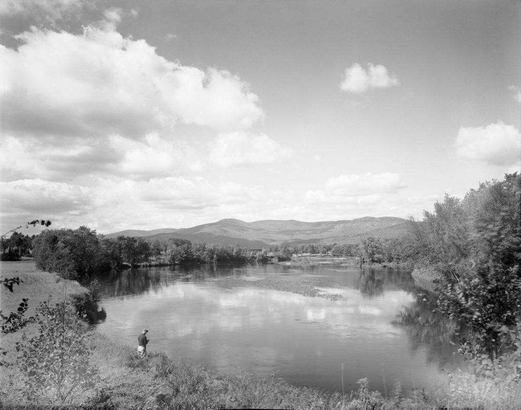 Miniature of Man Standing On Bank Of Androscoggin River, Distant Mountain Views In Bethel