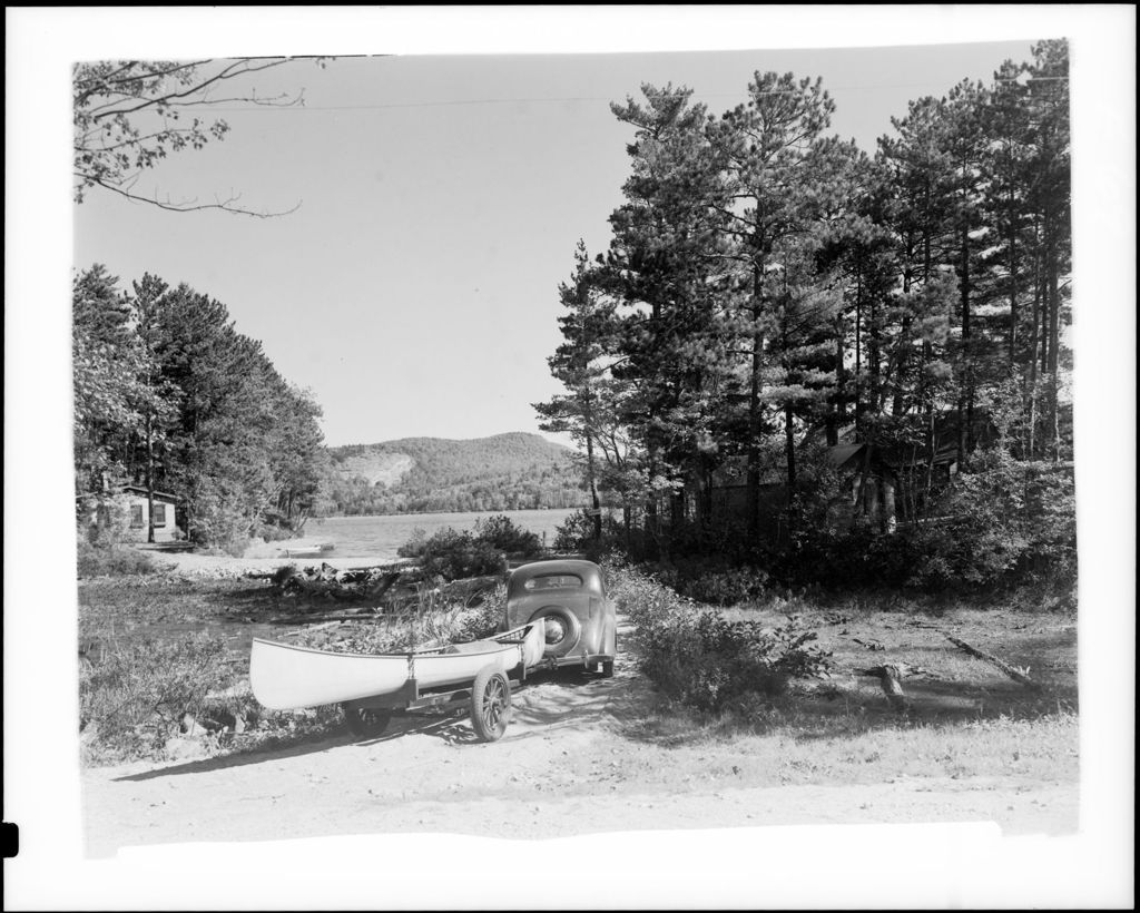 Miniature of A Car Towing A Canoe To The Water In Greenwood