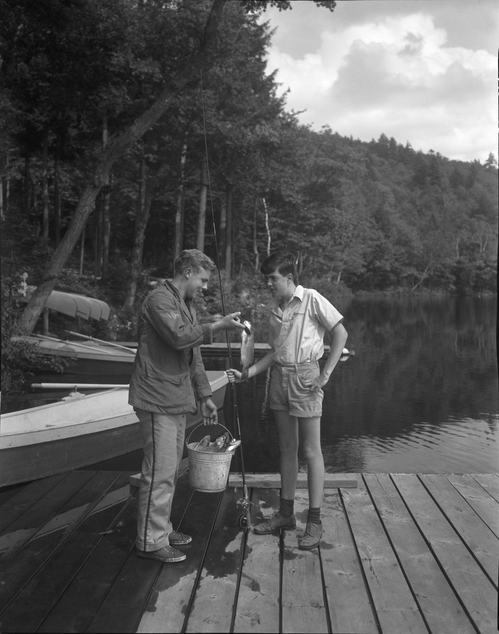 Miniature of Two Boys On Dock With Bucket Of Fish