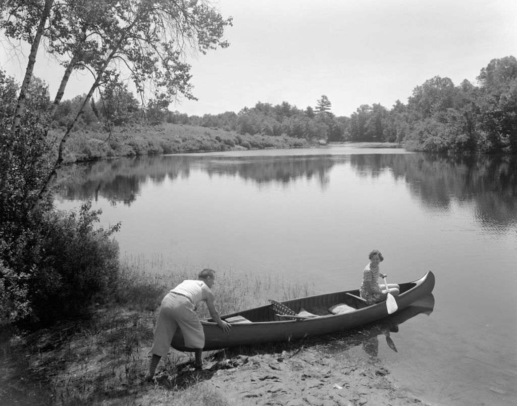 Miniature of A Couple Getting Into A Canoe At Great Ossipee