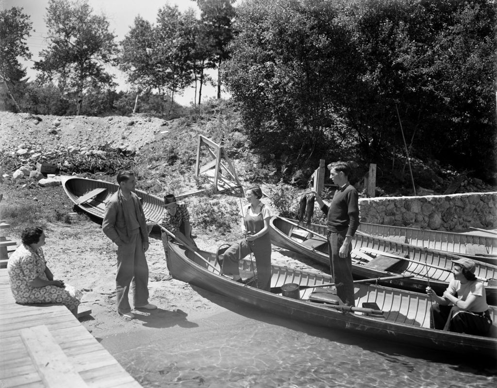 Miniature of People Talking In A Little Cove, Two Standing In A Boat