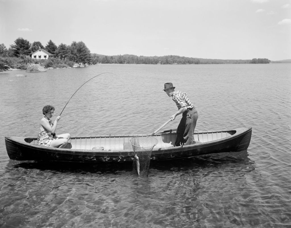 Miniature of Couple In A Canoe Fishing, House And Trees In Background