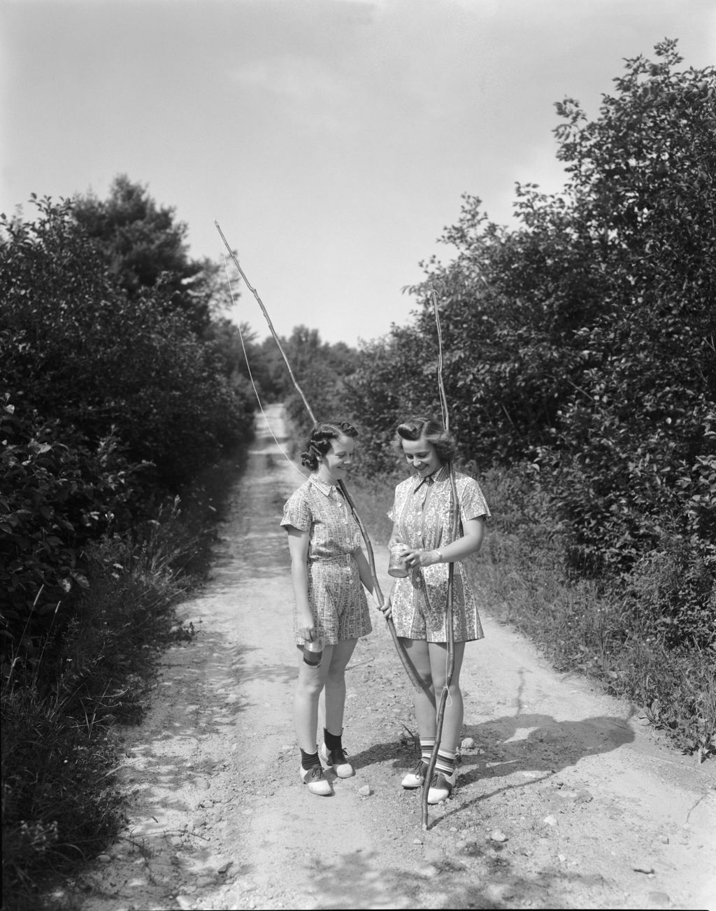 Miniature of Two Girls Going Out Fishing