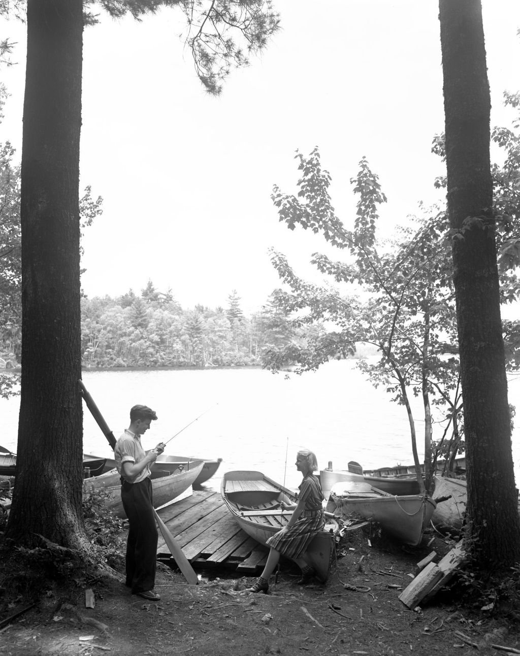 Miniature of Man And Woman Down By Docks Getting Ready To Go Fishing