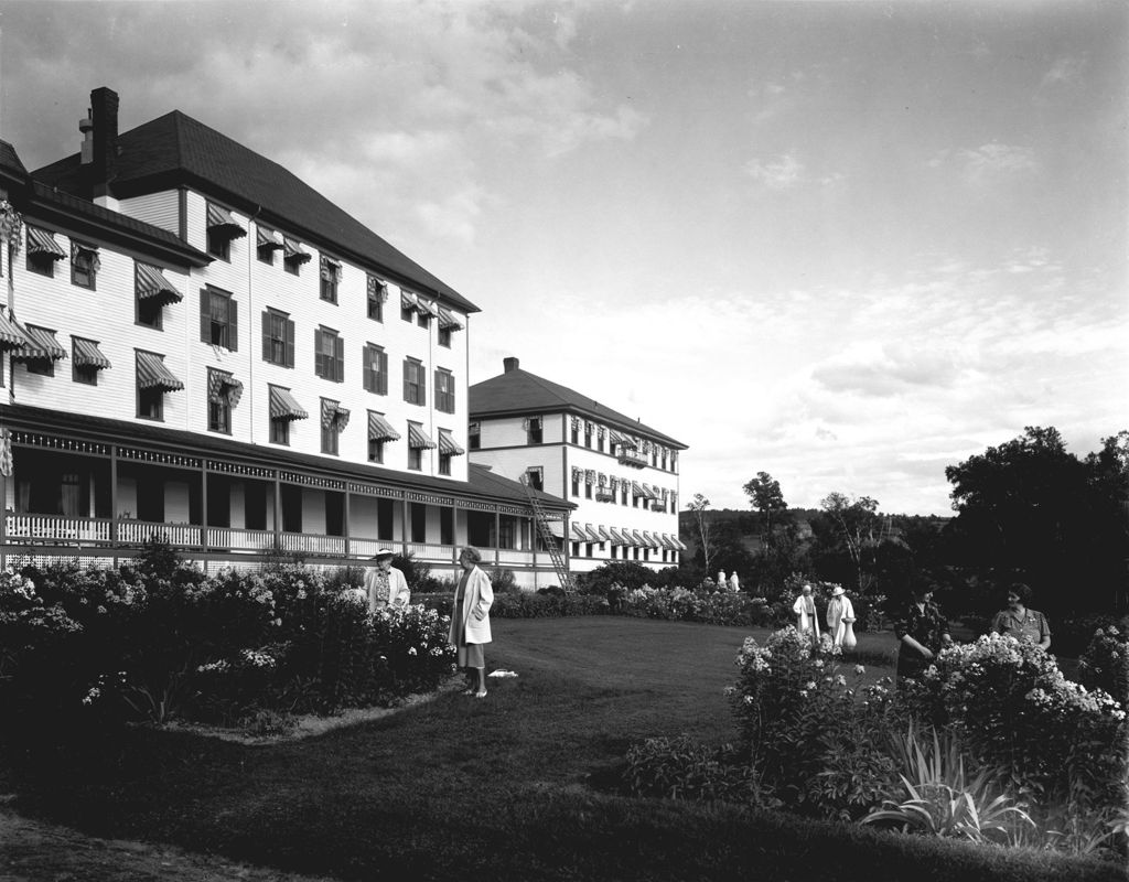 Miniature of People Enjoying The Flower Gardens Outside A Large Hotel In Rangeley