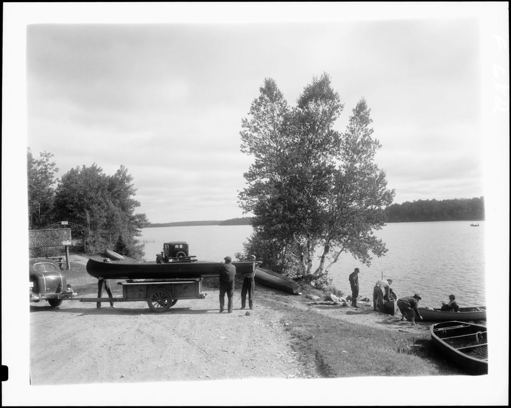 Miniature of Men Loading A Canoe Onto A Trailer