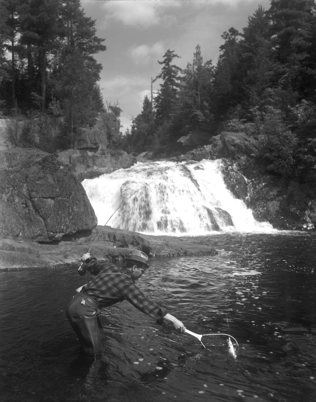 Miniature of Man Netting Fish Near Cupsuptic Falls In Rangeley