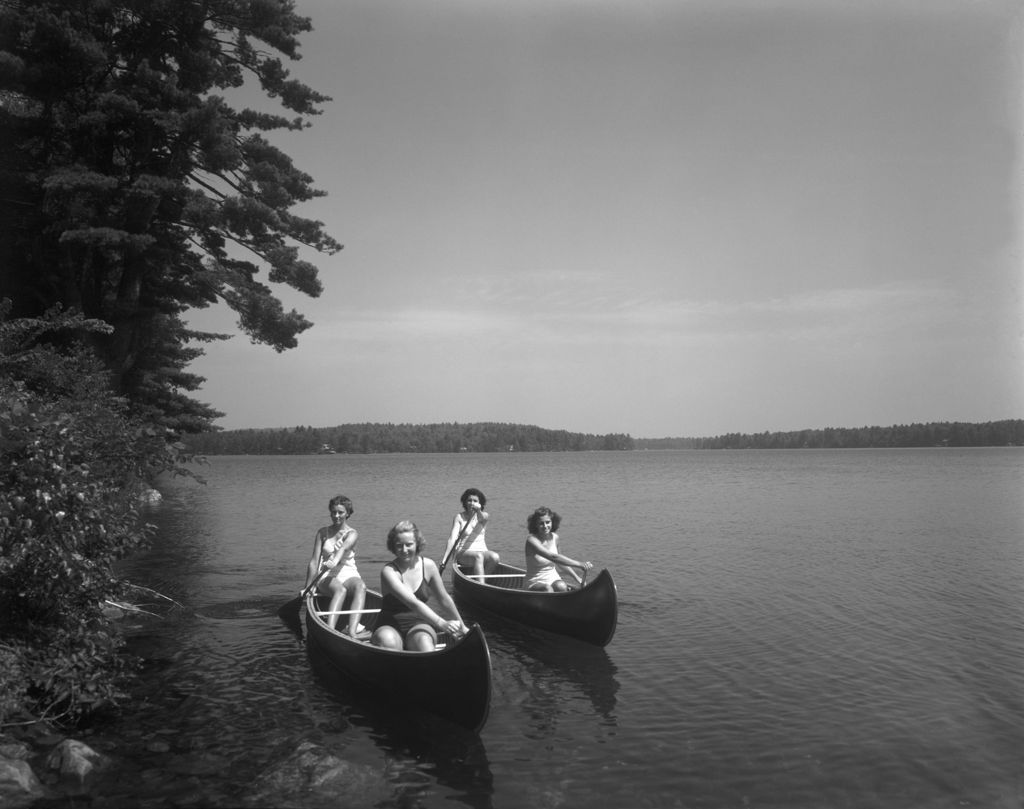 Miniature of Two Canoes With Two People Each Just Off Shore On Lake Ossipee