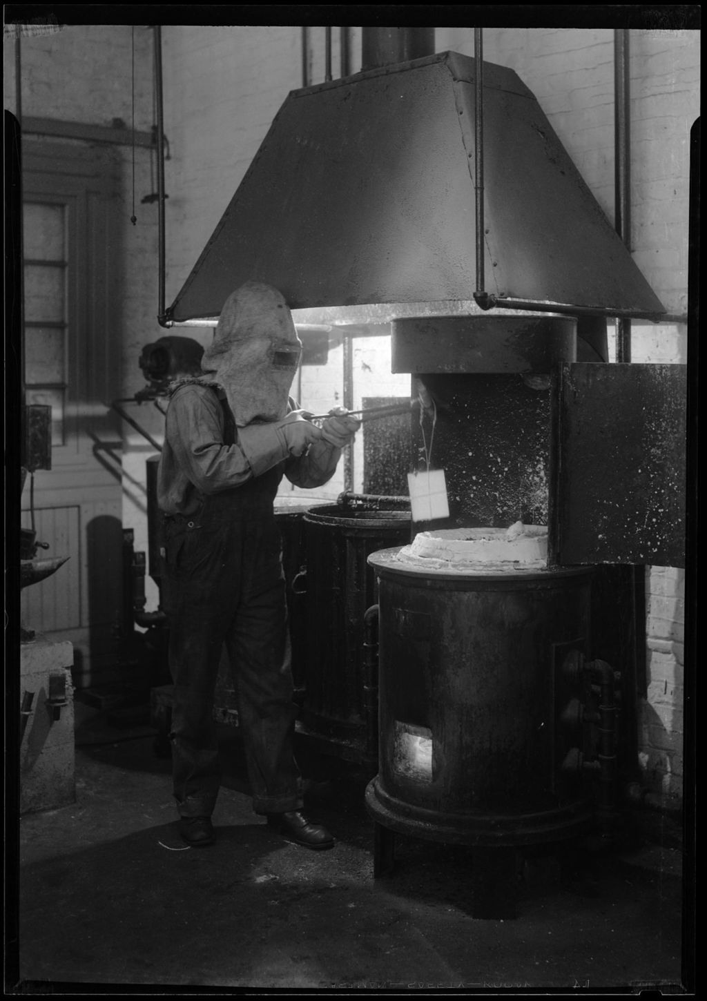 Miniature of Man In Protective Clothing Working With Heated Metal. "Sie Hardening"