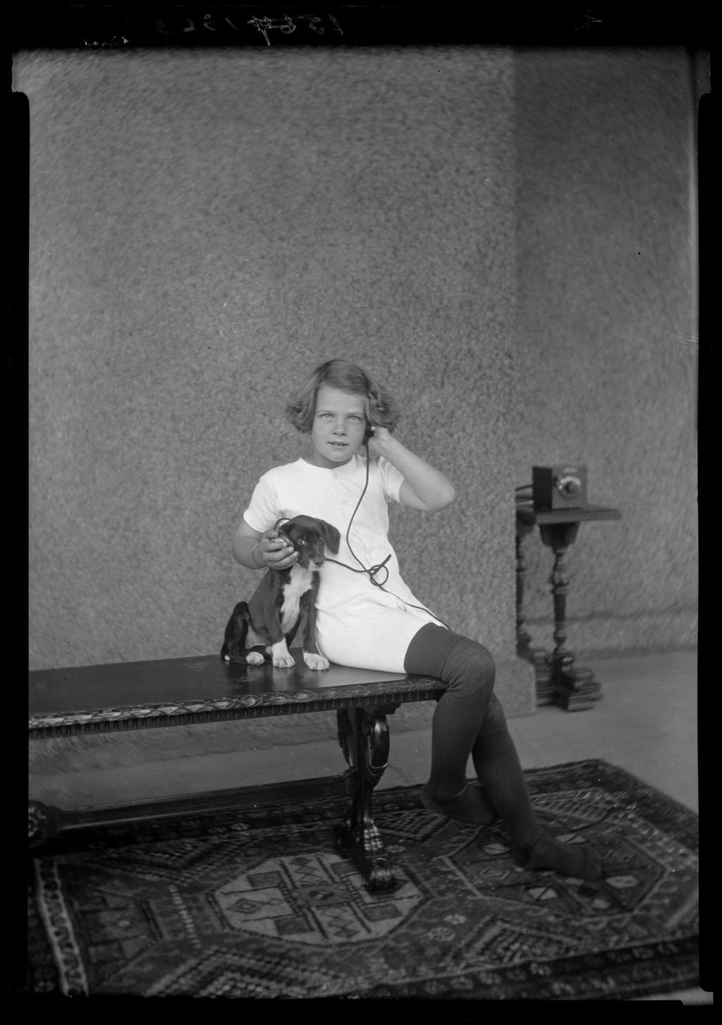 Miniature of Young Girl Listening To A Crystal Radio