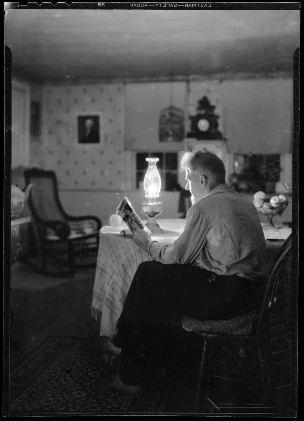 Miniature of George French Reading By Kerosene Lamp.