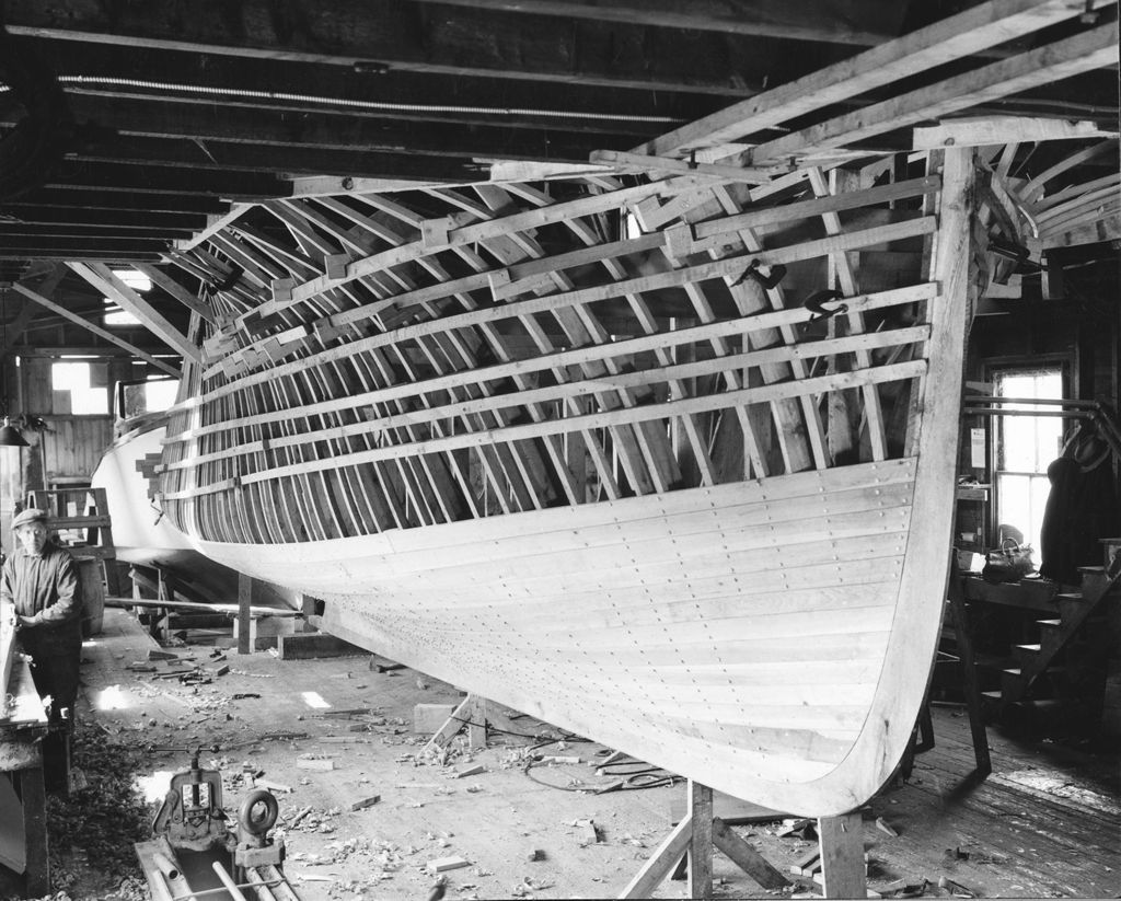 Miniature of Partially Planked Hull Of A Boat Under Construction "Photo By W. H. Ballard"