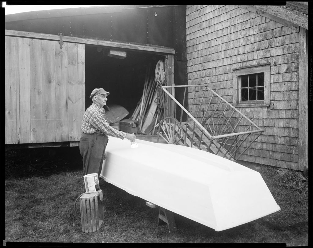 Miniature of Man Paints Boat, Wass Family Boat Builders