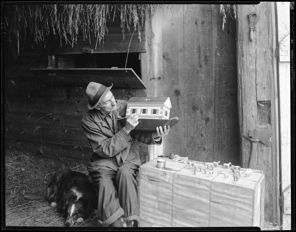 Miniature of Harry Paints Ark Model In His Barn, His Dog Sits Nearby