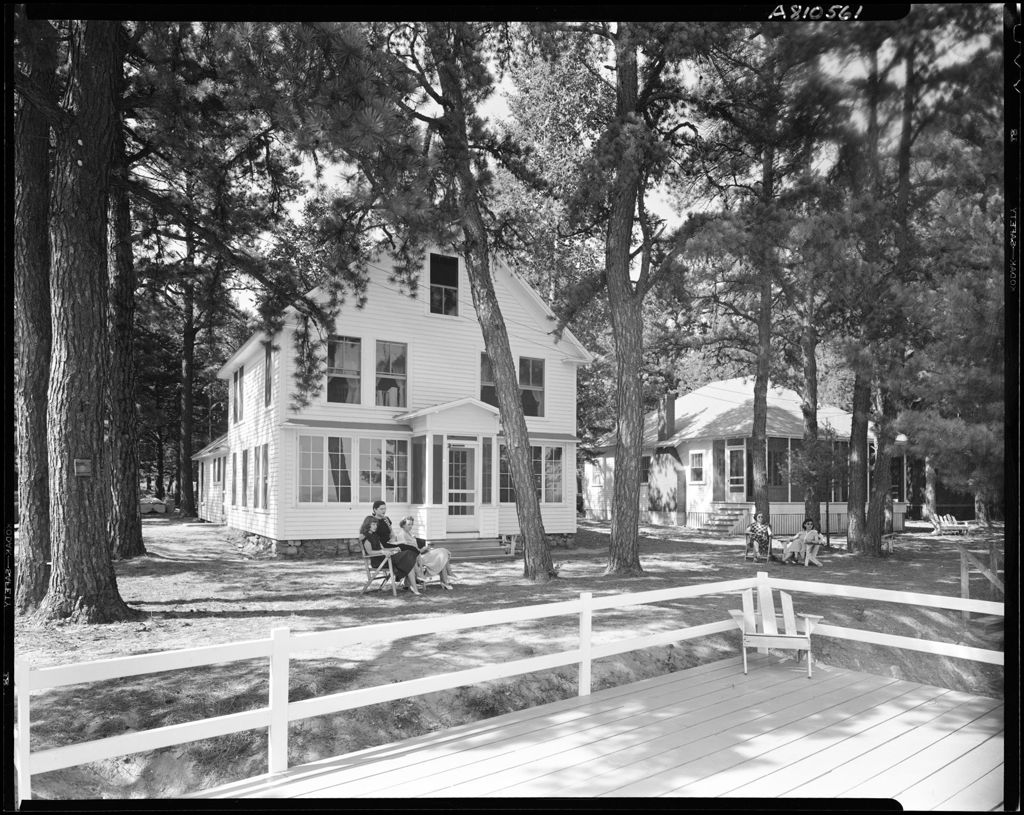 Miniature of People Lounging Out Front Of Cabins At Goodwin's Lodge In North Sebago