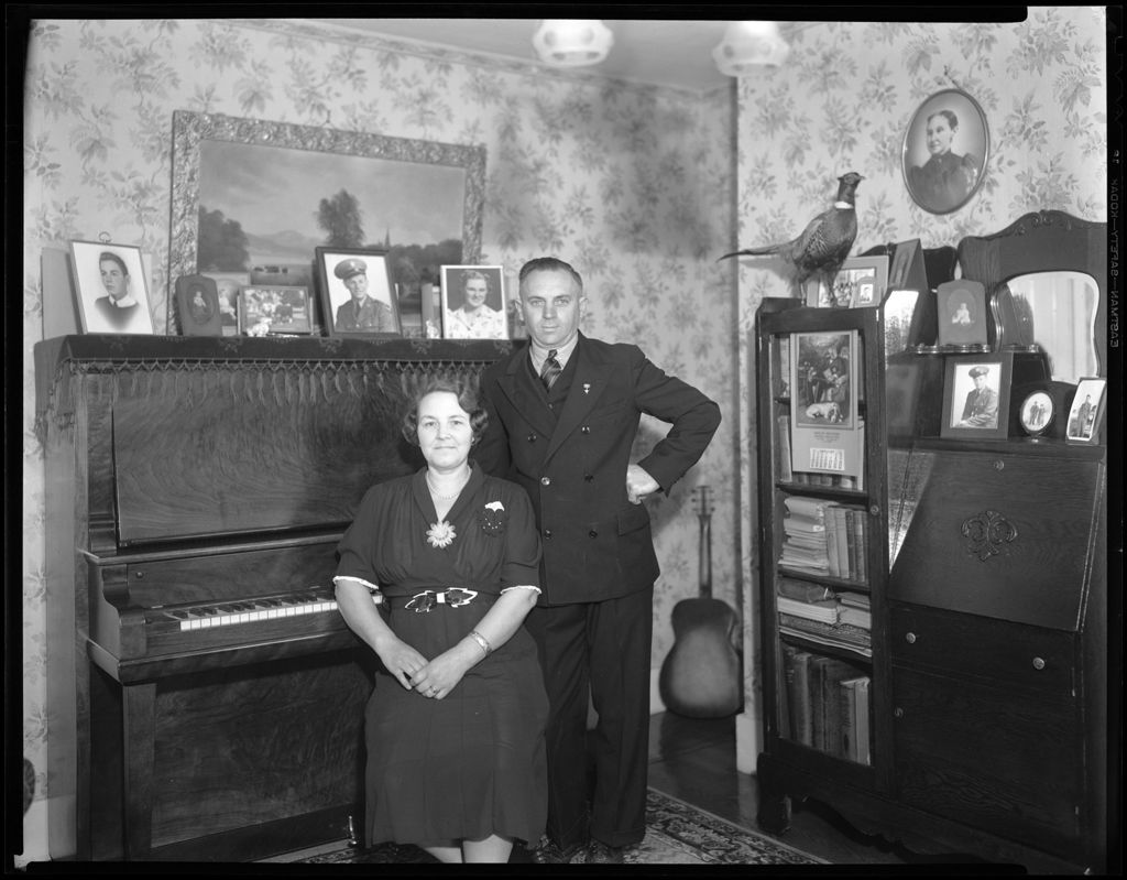 Miniature of Clayton And Wife (Stacy) In Their Living Room, Bookcase/desk, Piano And Many Photos In View
