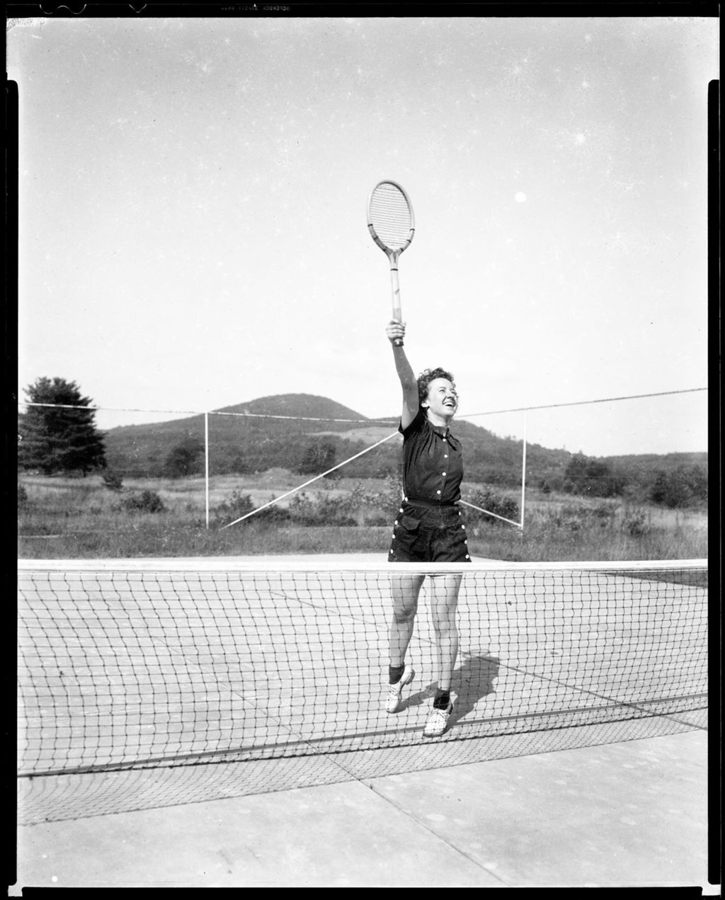 Miniature of Model, Natalie Caston, Reaching For A High Tennis Ball Near The Net