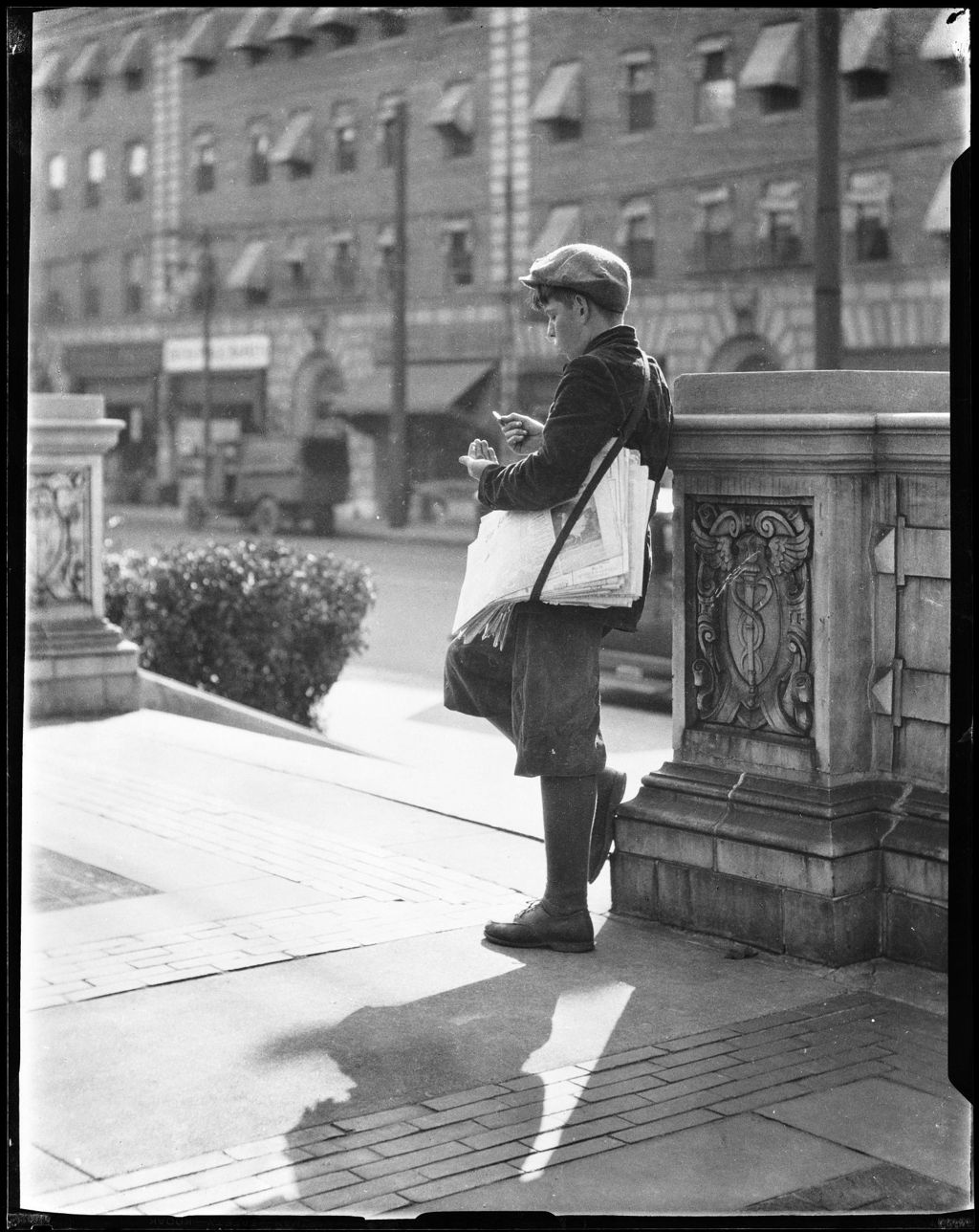 Miniature of Newsboy Counts His Money On Street Corner (Donald)