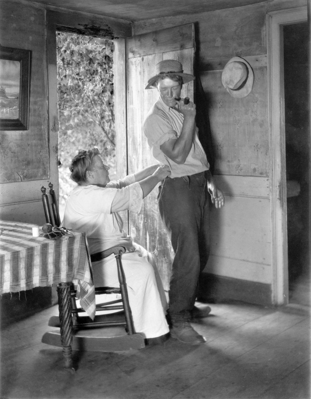 Miniature of Ma French Takes Out A Stich In His Pants By The Open Door