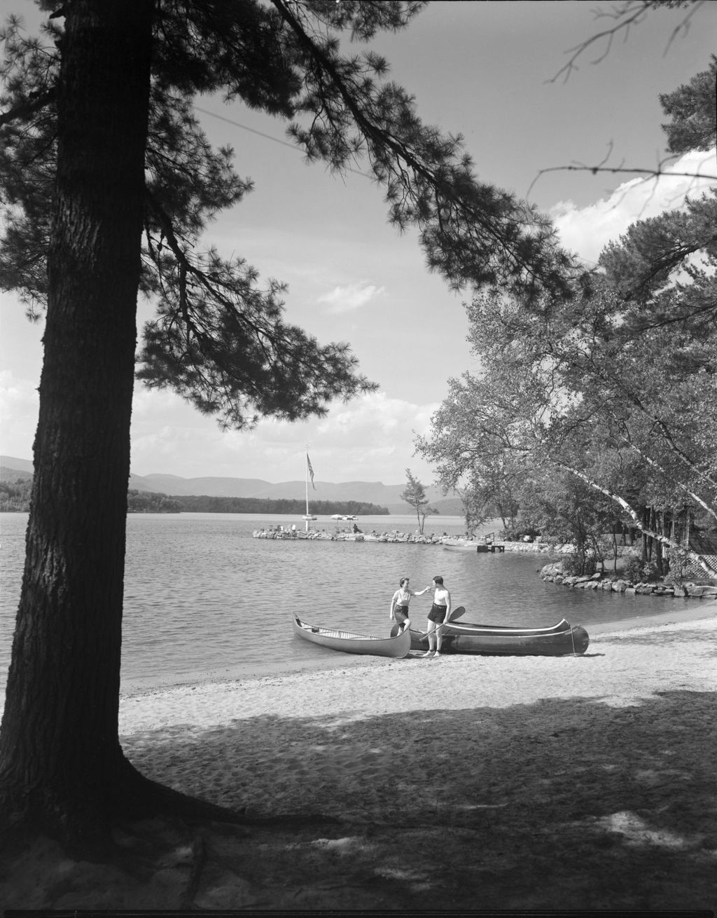 Miniature of A Couple Getting Out Of A Canoe At Kezar Lake